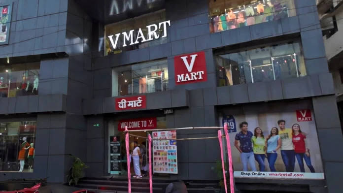 Front facade view of a popular Dumka shopping mall, like V-Mart and Reliance Trends, located near Thana Road market.